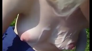 Outdoor handjob by the wife and nice cumshot on her curvy little tits